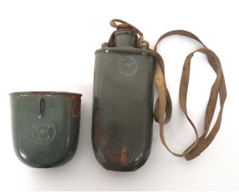 WW1 Imperial Austrian Waterbottle And Cup green enamel, round base waterbottle. &nbsp;Top with two loops to hold the canvas s