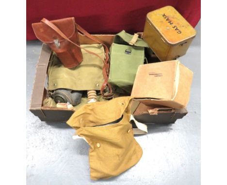 Selection Of British WW2 Respirators consisting British Army hose example complete in 1942 dated transit box ... Post war, li