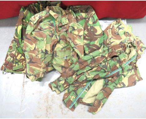 Selection Of Vintage Camouflaged Clothing including 3 x DPM camouflaged combat smocks. One example with added lower cuff pock