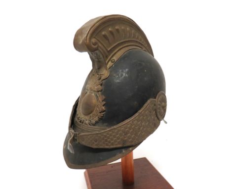 Late 19th Century French Fire Service Helmet black painted crown and attached front peak and rear brim, both with brass edgin