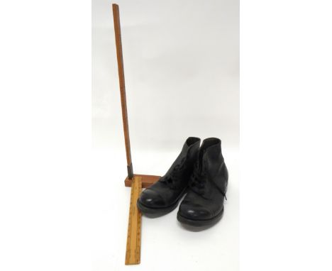 Pair Of 1944 Dated British Ammunition Boots And Size Gauge black leather ankle boots. &nbsp;Reinforced toe section. &nbsp;Lea