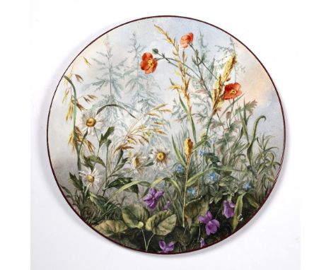 Boch Freres Keramis ceramic charger with floral decoration, with black mark and impressed code to the reverse, the front sign