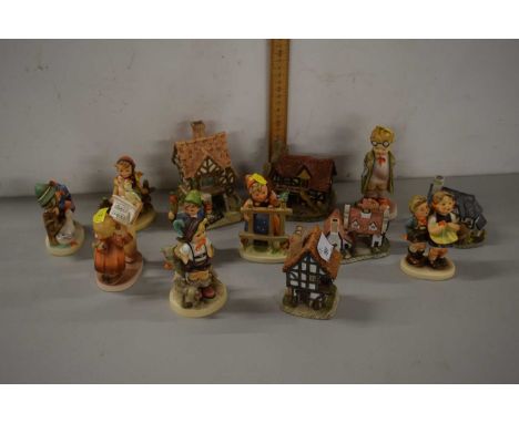 Quantity of Hummel figures of children together with David Winter model cottages and others