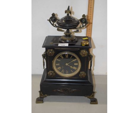 Late Victorian black slate cased mantel clock with urn mount