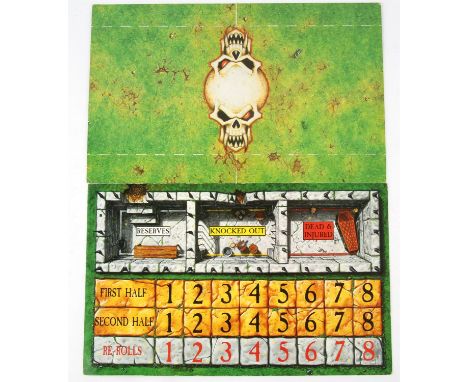 Blood Bowl board, cardboard dug outs, and a non Games Workshop felt pitch. Blood Bowl is a miniatures board game created by J