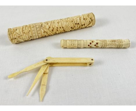 2 antique ivory highly carved needle cases together with a pocket manicure/vanity tool. Largest case approx. 13 cm long. Tota