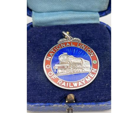 A silver and enamel fob medallion for the National Union Of Railwaymen. Complete with vintage box.  Hallmarked Birmingham 194