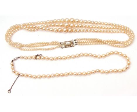 Mixed Lot: cased simulated Lotus pearls, triple row, together with a Ciro single row simulated pearl necklace (2)