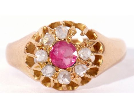 Early 20th century 18ct gold ruby and diamond cluster ring, the circular faceted cut ruby within a small old cut diamond surr