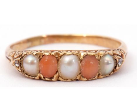 Vintage yellow metal seed pearl, coral and diamond ring, alternate set with three seed pearls and two coral stones and highli