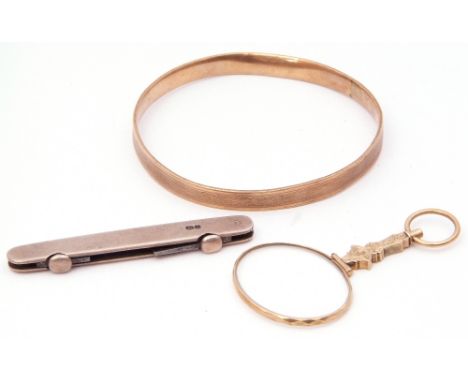 Mixed Lot: antique gold plated quizzer, a rolled gold bangle with chased and engraved design, together with a silver cased pe
