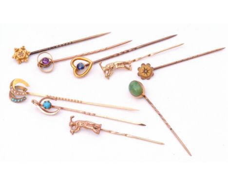 Mixed Lot: nine vintage stick pins, the finials with small diamond, amethyst, turquoise and sapphire examples, four stamped 9