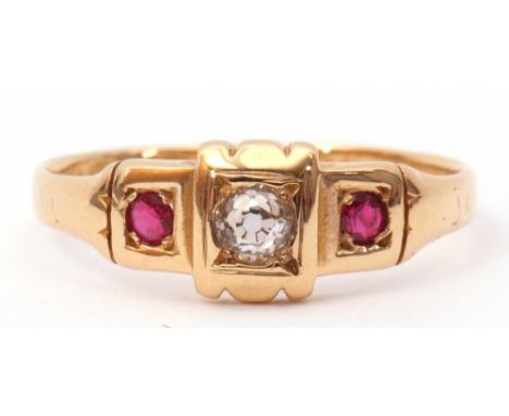 Antique 18ct gold diamond and ruby ring, the centre old cut diamond box set and flanked between two similar set small round f