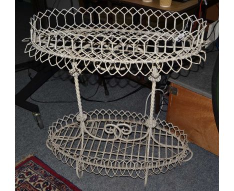 A Victorian painted wirework two-tier planter 85cm by 43cm by 83cmCondition report: Some misshapping to the wire borders. Top