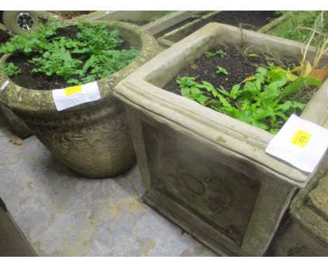 Two composition garden planters to include a square framed planter decorated with floral motifs, 44 x 40cm w 