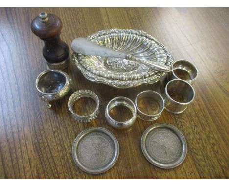 Mixed silver items to include napkin rings, tray, together with two white metal small saucers and other items 