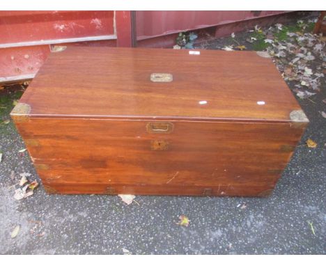 A camphor wood brass bound trunk having twin carrying handles 47cm h x 102cm w 