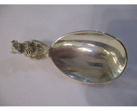 A 1980s Brian Fuller silver caddy spoon, the handle in the form of a Glis Glis Dormouse 
