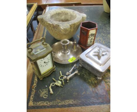 A five window carriage clock and keys, a mortar, a pair of white metal knife rests in the form of dogs, a candle holder and o