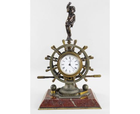 A LATE 19TH CENTURY NOVELTY DESK COMPENDIUM TIMEPIECE, the aneroid barometer dial bears the R.D.E monogram, as a ships wheel 