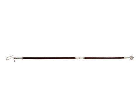  A Victorian silver toasting fork with plum pudding mahogany shaft  , Hallmarked London 1887-88, with ribbed detail and scall