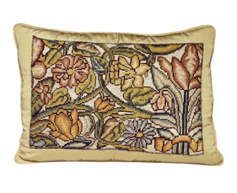 A French yellow silk needlework now mounted as a cushion, early 18th century,   with a design of stylized leaves and flowers