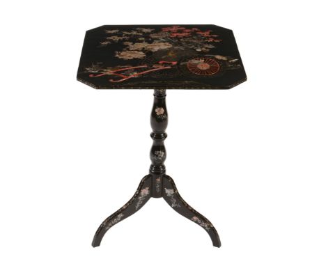 Ω A Japanese export black lacquer occasional table, late 19th century , the octagonal tip top inlaid with a mother of pearl a