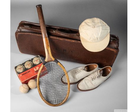 Lawn Tennis Victorian leather case, circa 1900,of rectangular form with leather bound handle and initialled A.B.C. on the fro