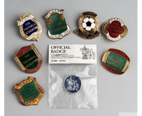 Nice group of seven Football Association Wembley Stewards enamel lapel badges1980 (x2), 1981 (x2), 1982 (x2), 1983 and commem
