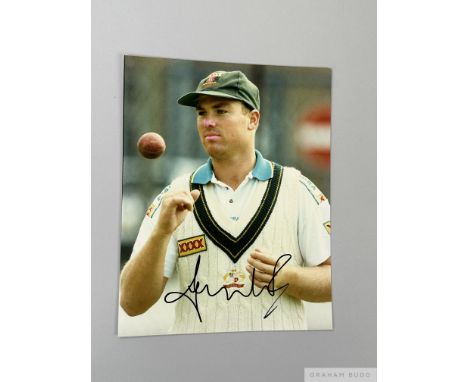 Excellent cricket coloured signed photograph of Shane Warne, 10 x 8in., shows close up of Warne in Australian sweater and cap