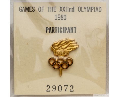 Moscow 1980 Olympic Games IOC participant's badge, designed with Olympic Torch & Ringsand dated '1980, affixed to card inscri