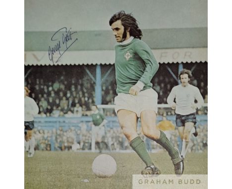 George Best Northern Ireland autographed colour picture removed from an old book, signed by George in blue biro it shows Best