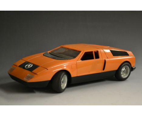 Schuco Toys - a battery operated plastic large scale Mercedes sports car, 5508, C111 - orange body,gull wing doors, black int