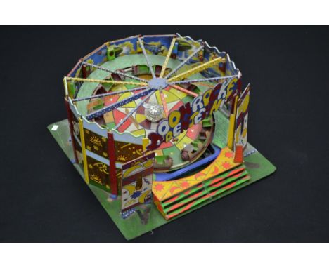 A scratch built model of a fairground ride, Moon Rocket, Denjeani, by Dennis Coleman, wooden body, electric motor, illuminati