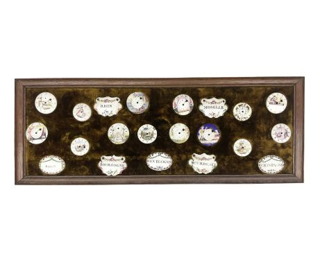 Collection of twenty one 18th and 19th century enamel wine labels and pocket watch faces, the labels inscribed 'Rhin', 'Bourg