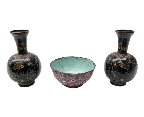 Pair of 19th/ early 20th century Cloisonne vases with  bulbous bodies, decorated with Cockerels in flight on a black floral g