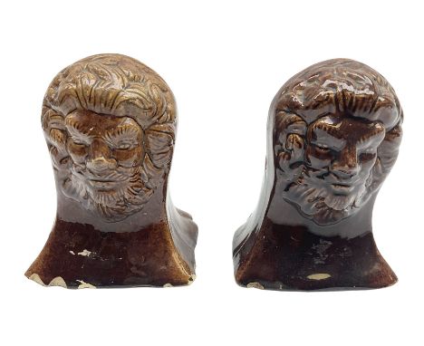 Pair of 19th century treacle glaze furniture/sash window rests modelled as lions, H12.5cm
