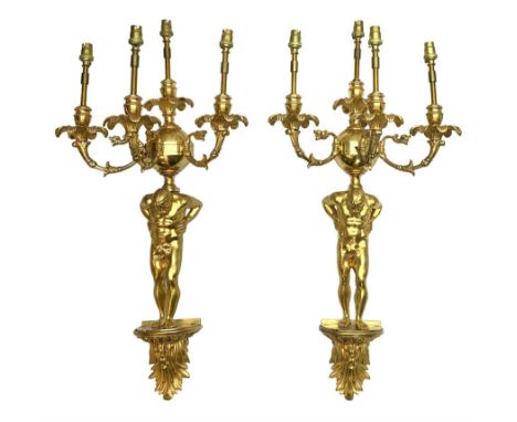 Pair of 19th century and later ormolu wall sconces, each modelled as an Atlas figure stood upon a curved bracket with acanthu