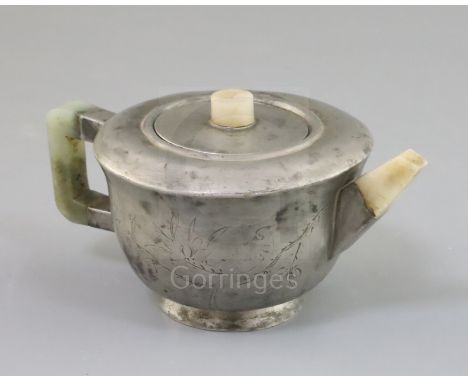 A Chinese pewter mounted Yixing teapot, Daoguang mark and of the period (1821-50), the body engraved with an inscription and 