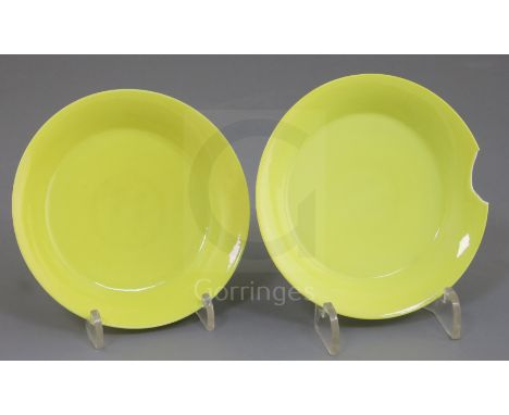 A fine pair of Chinese lemon yellow saucer dishes, Yongzheng mark and possibly of the period, each thinly potted and inscribe