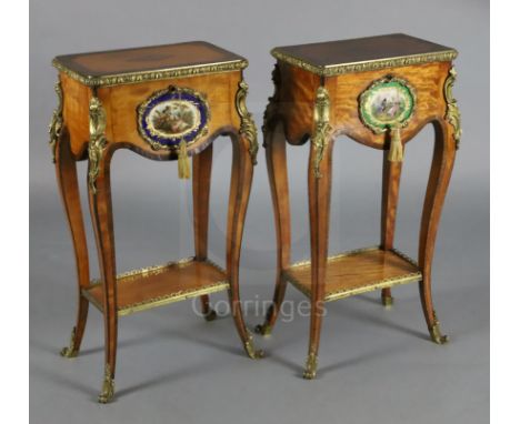 A pair of Louis XVI style ormolu mounted satinwood gueridons, both with rising lids, one fitted as a tea caddy, the other a j