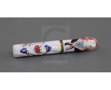 A Battersea or South Staffordshire enamel needle case, mid 18th century, decorated in St. Cloud style, with a love motif and 