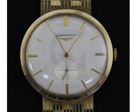 A gentleman's early 1960's 9ct gold Longines manual wind wrist watch, on a 9ct gold Longines bracelet, in Longines box.