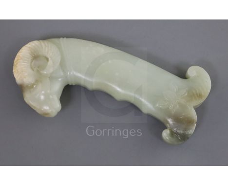 A Mughal jade dagger hilt, carved with a ram's head and stylised flowers, 5in.