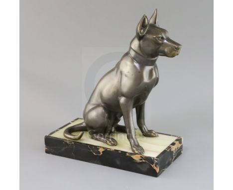 Attributed to Irene Rochard. An Art Deco bronzed model of a seated alsatian, on two colour marble plinth, height 13in.