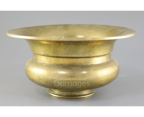 An 18th/19th century Ottoman high tin bronze bowl, inscribed 'Haji Mohammed' to the edge of the rim and the underside of the 