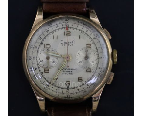 A gentleman's Dreffa Geneve 18ct gold manual wind chronograph wrist watch, with silvered dial, on associated leather strap