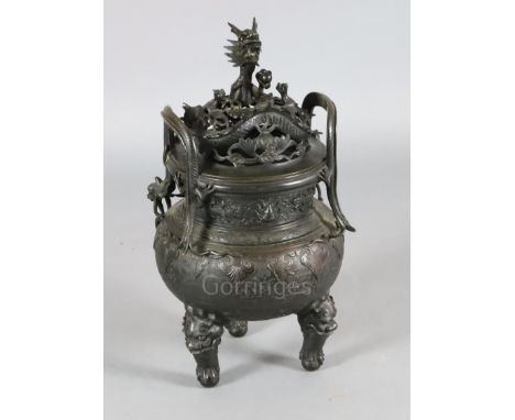 A rare Chinese archaistic bronze censer and cover, Xuande fifteen character mark but 19th century, cast with taotie masks, th