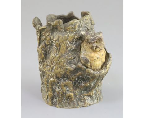 A 19th century Austrian cold painted bronze vase, modelled with an owl in a tree trunk, height 4.5in.
