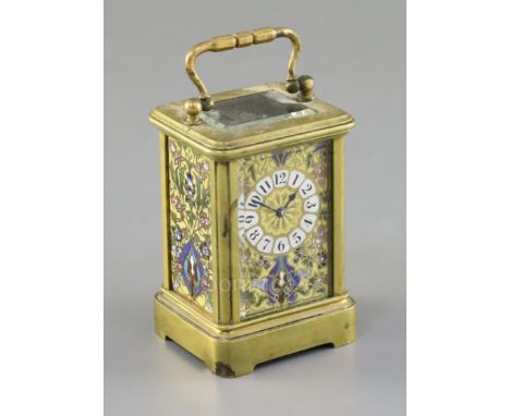 A French miniature brass and champleve enamel carriage timepiece, c.1900, decorated with panels of stylised flowers, 3in.